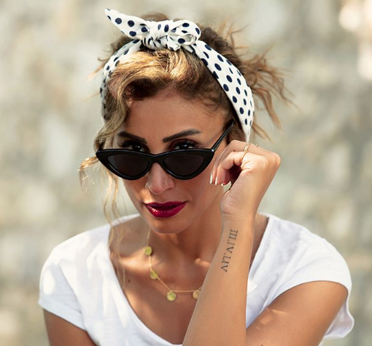 دينا الشربيني وشم عمرو دياب