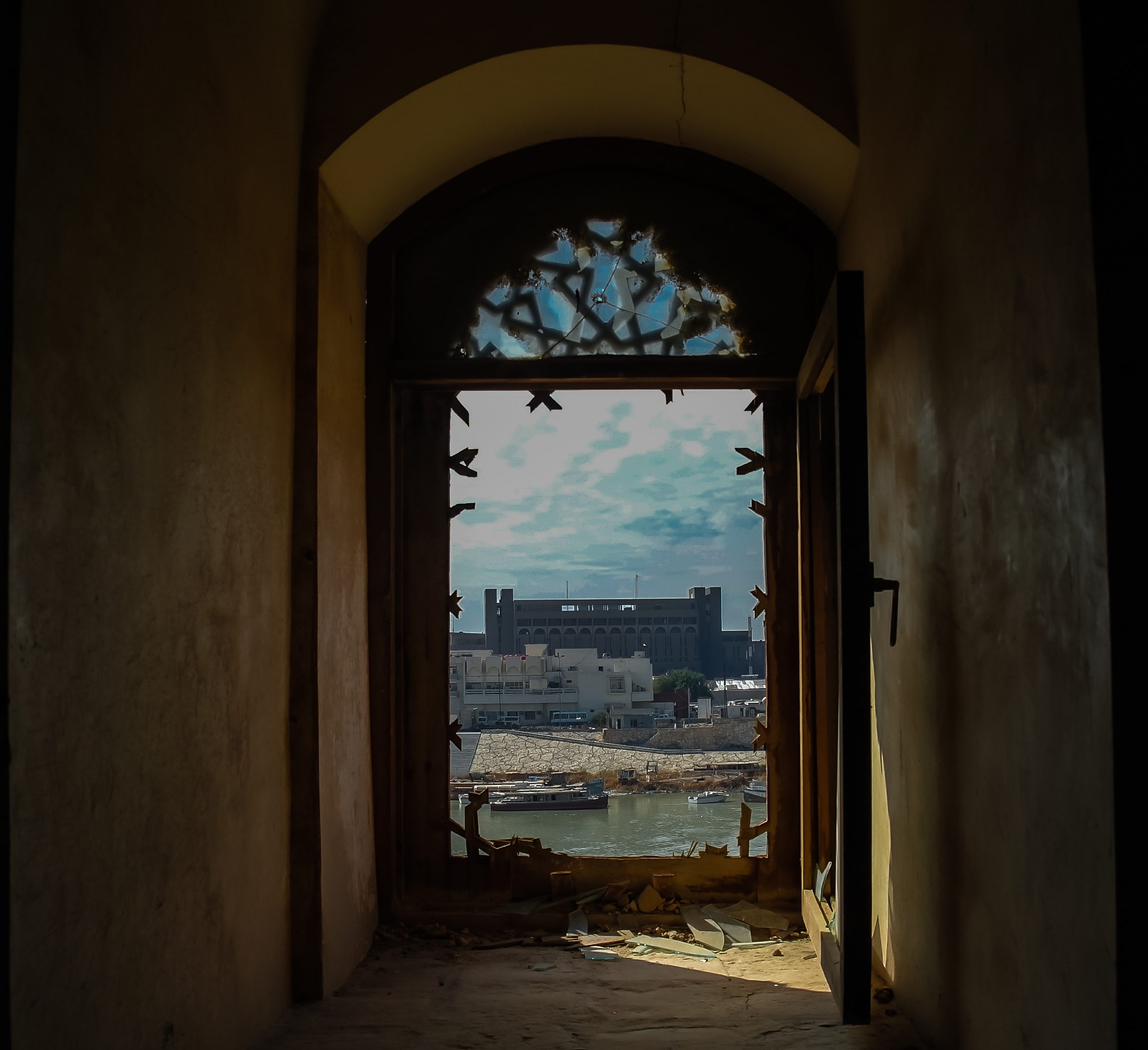 View to Baghdad and Tigris river from the broken window of Al-Mustansiriya Madrasah, Iraq
