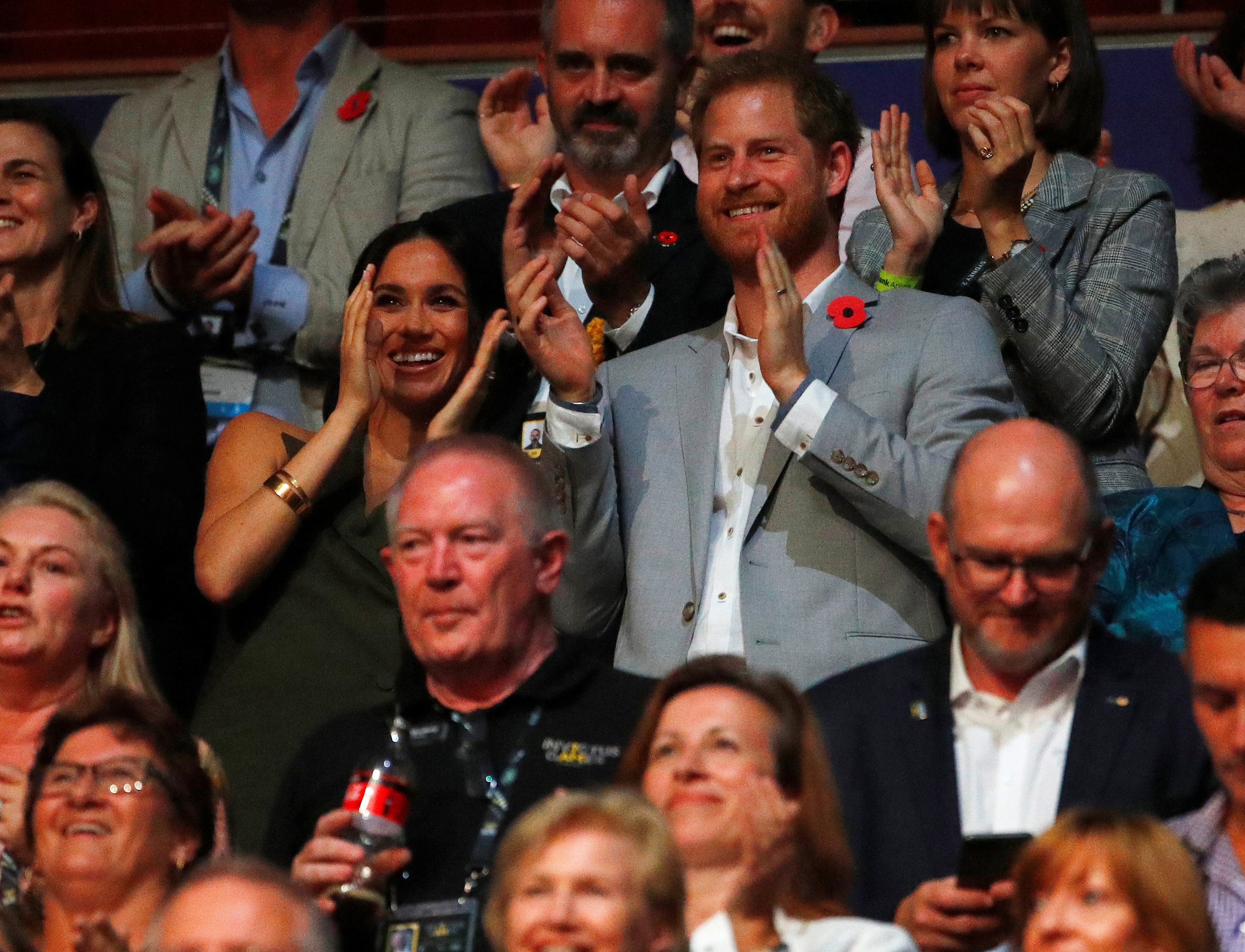 الأمير هاري وميغان ماركل في ختام حفل Invictus games فيي سيدني/REUTERS