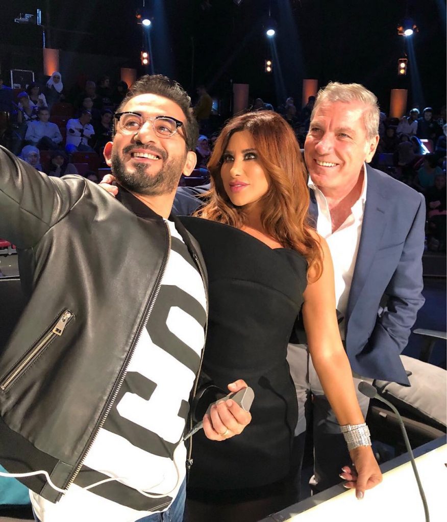 نجوى كرم قصَّت خصلتين من شعر أحمد حلمي