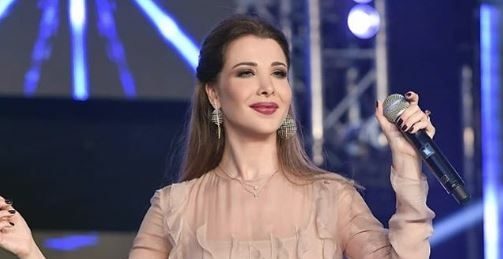ظهور نانسي عجرم ببطن منتفخ في حفل بدبي.. رقصت برشاقة على المسرح رغم اقتراب موعد الإنجاب