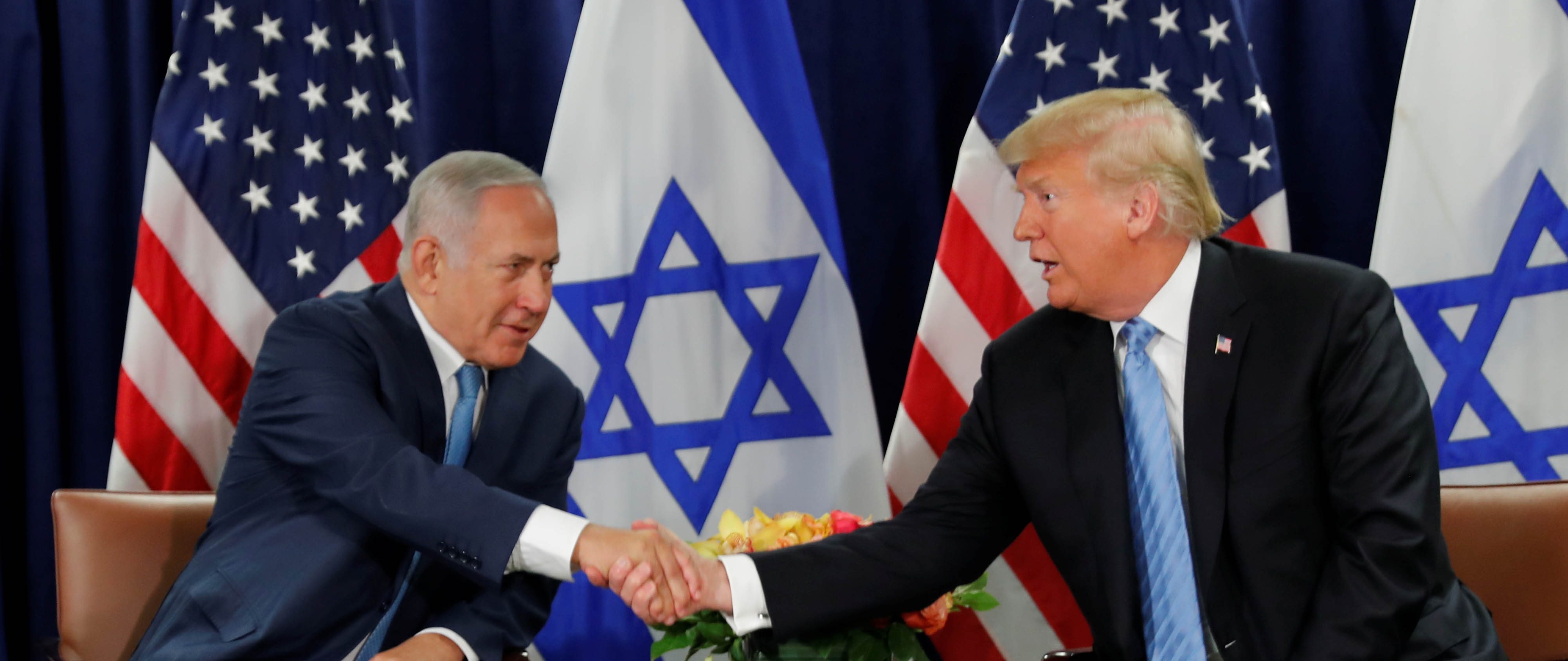 ترامب أثناء لقاء مع نتنياهو في واشنطن / رويترز