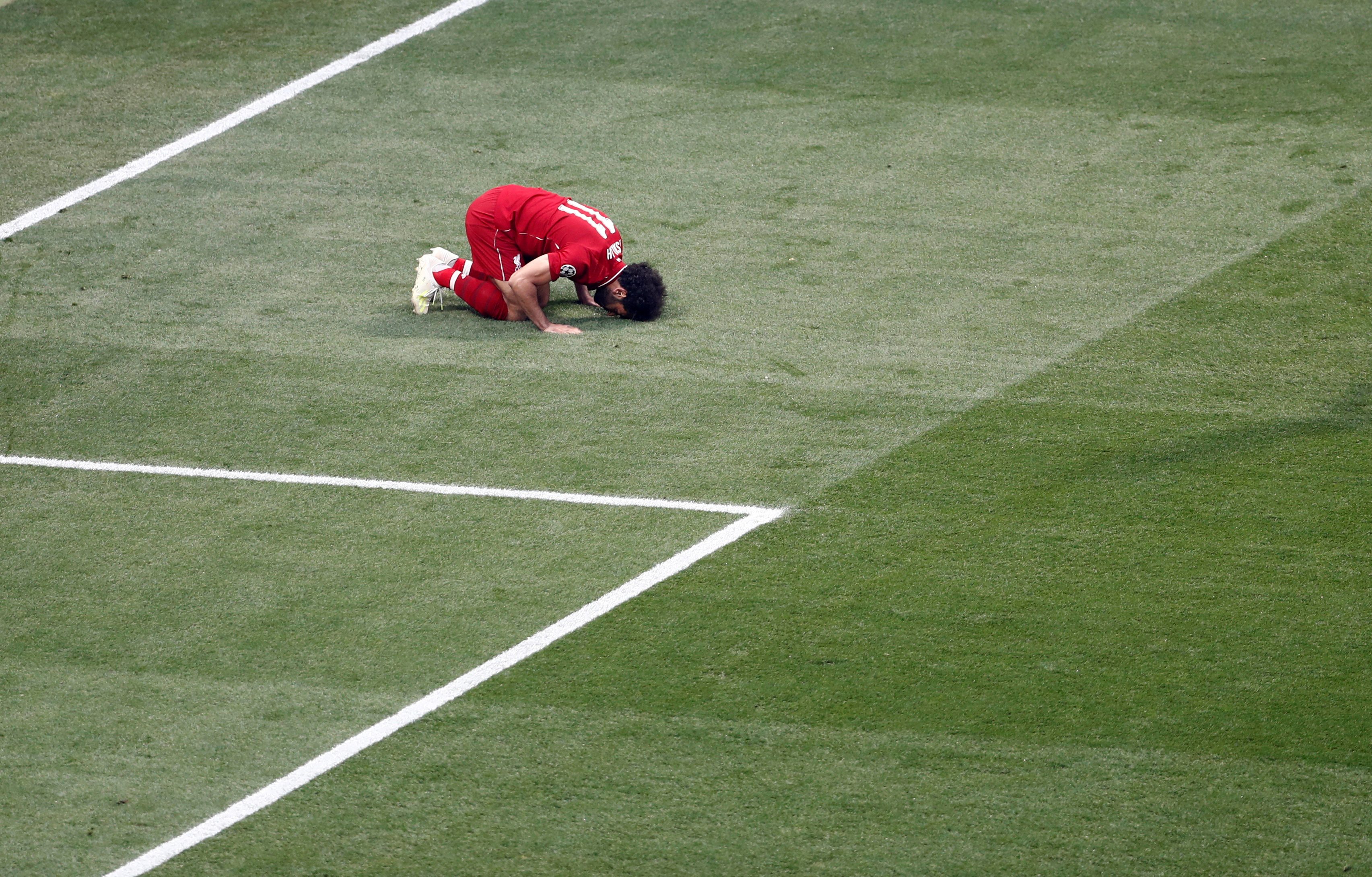 نهائي دوري أبطال أوروبا - توتنهام هوتسبر - ليفربول - واندا متروبوليتانو ، مدريد ، إسبانيا - 1 يونيو 2019 يحتفل محمد صلاح لاعب ليفربول الإنجليزي بتسجيل هدفه الأول من ركلة جزاء (رويترز)