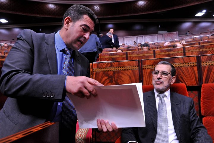 سعد الدين العثماني رئيس الحكومة في المغرب ووزير التعليم سعيد أمزازي (رويترز)