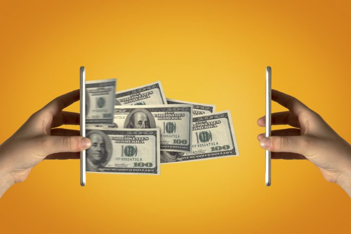 في عصرنا، أصبحت معظم الأموال في الواقع إلكترونيةً/ Istock