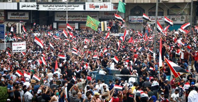 محتجو العراق يعلنون عن اعتصام مفتوح في 9 محافظات رغم حظر التجوال