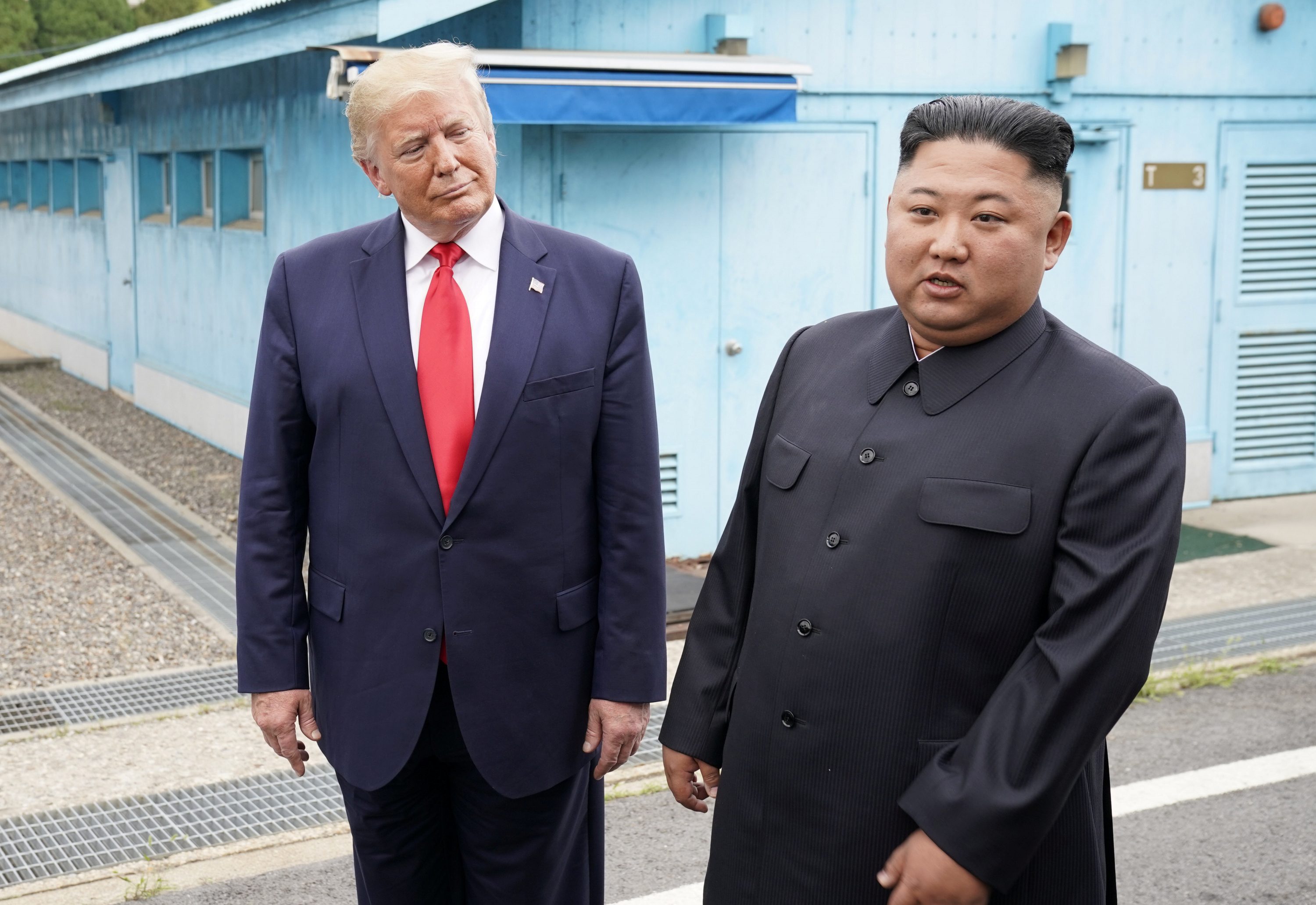 زعيم كوريا الشمالية مع الرئيس الأمريكي/رويترز