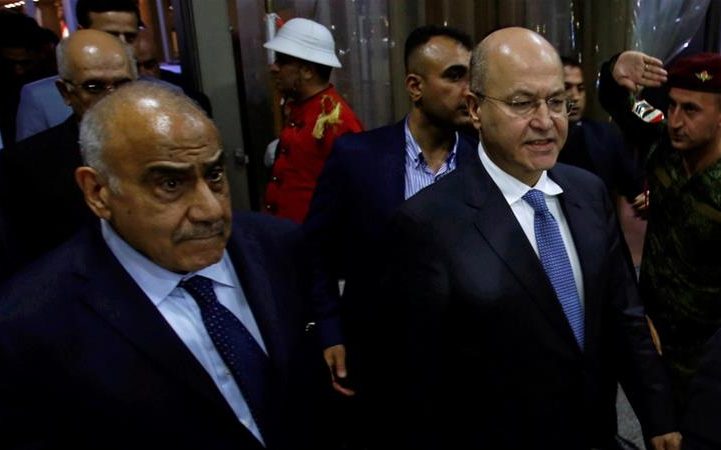الرئيس العراقي برهم صالح ورئيس الحكومة المستقيل عادل عبد المهدي/رويترز