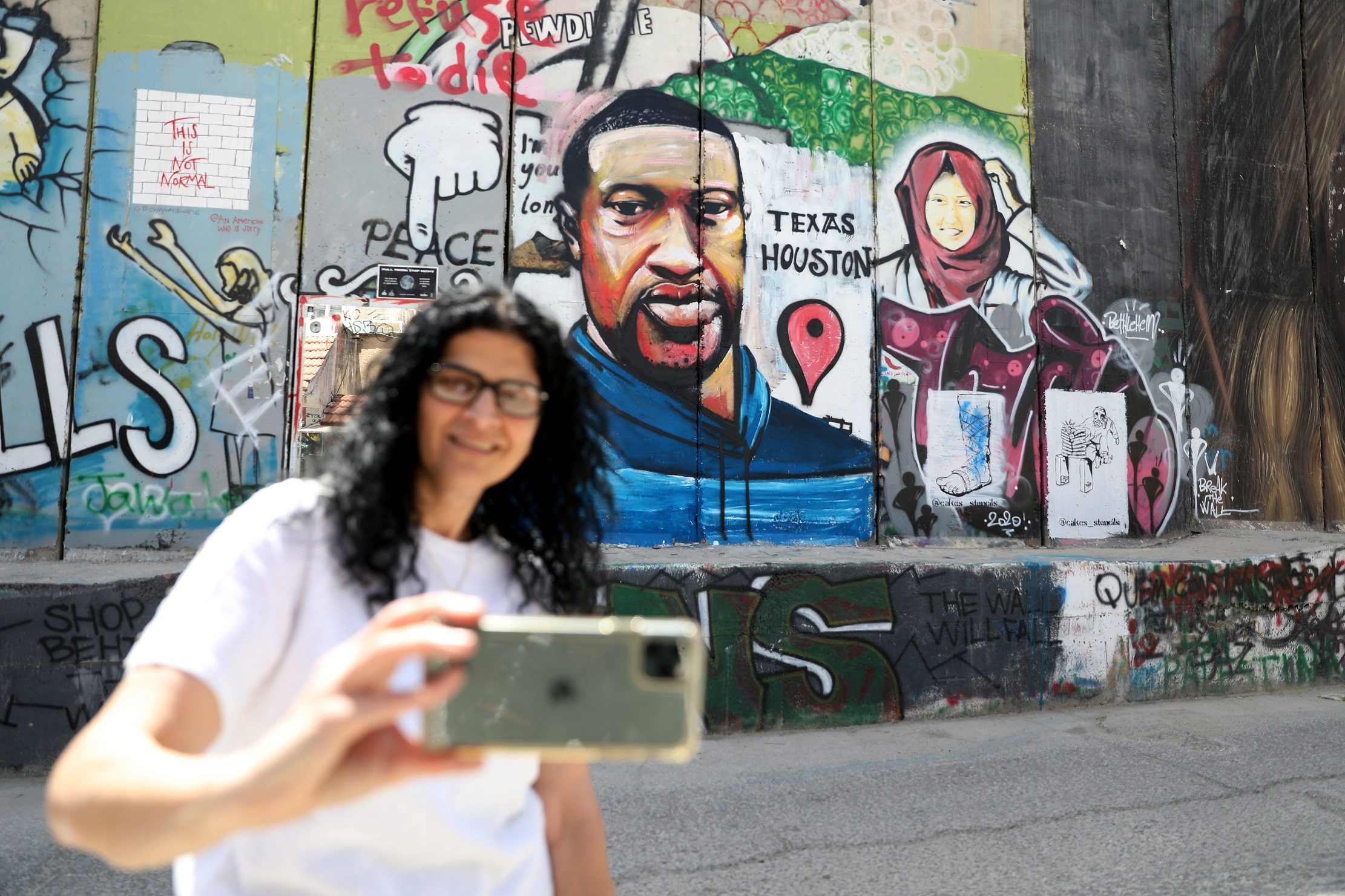 الرسمة بريشة مجهول الهوية بمدينة بيت لحم جنوبي الضفة الغربية المحتلة/الأناضول