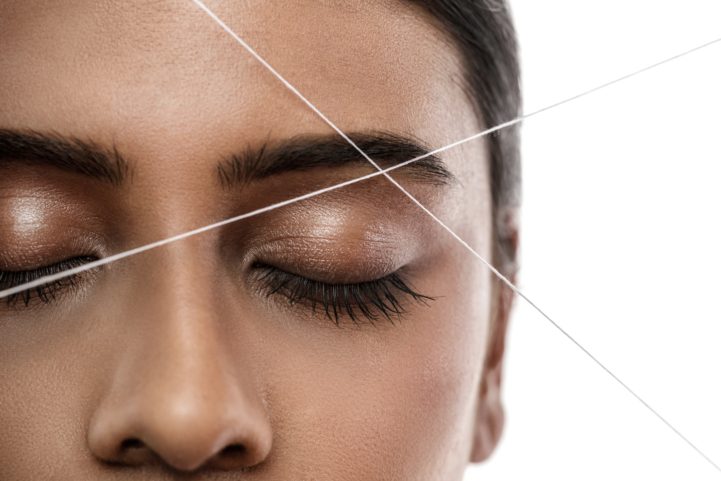 istock \ إزالة شعر الوجه بالخيط