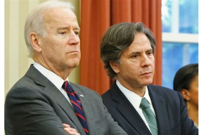 خطر شيوعي رسمي واليمين المتطرف المسلح.. بايدن والولايات المتحدة على صفيح ساخن