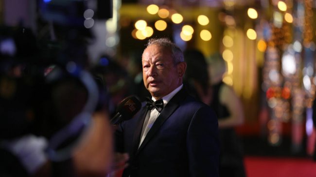 هل يتخلى ساويرس عن حلم “الجونة” بسبب ضغوط “المتحدة للإعلام”؟ تاريخ من الصراع بينهما منذ بدايته