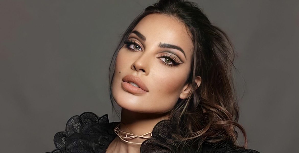 نادين نجيم تتشقلب بخفة في الهواء بعد أن شجعها طفلاها على تجربة الجمباز (فيديو)