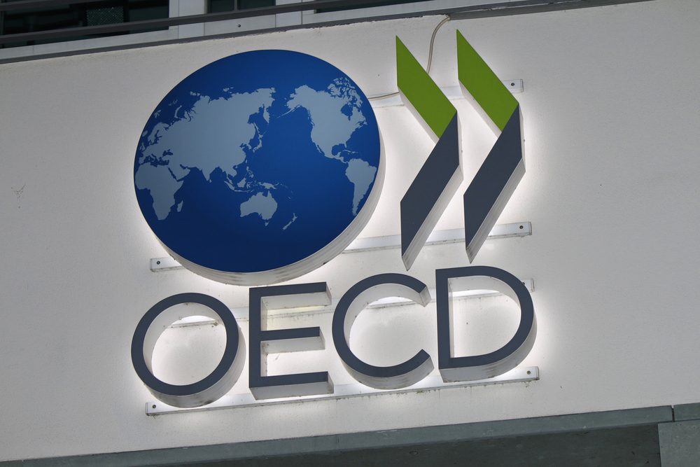 ما هي منظمة التعاون الاقتصادي والتنمية OECD وما دورها في تعزيز التجارة الدولية؟