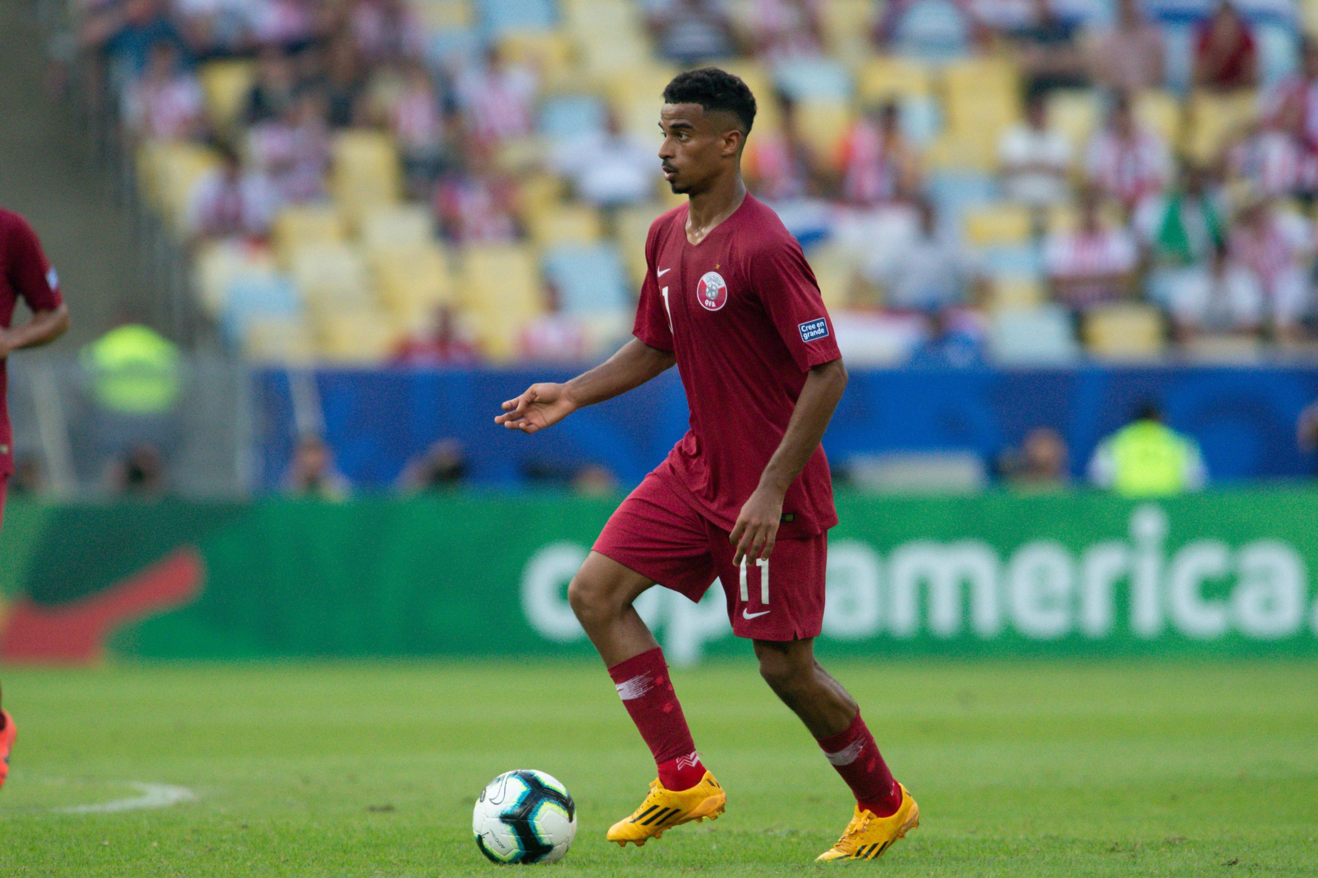 Shutter Stock/ لماذا يطلق على منتخب قطر لقب العنابي؟