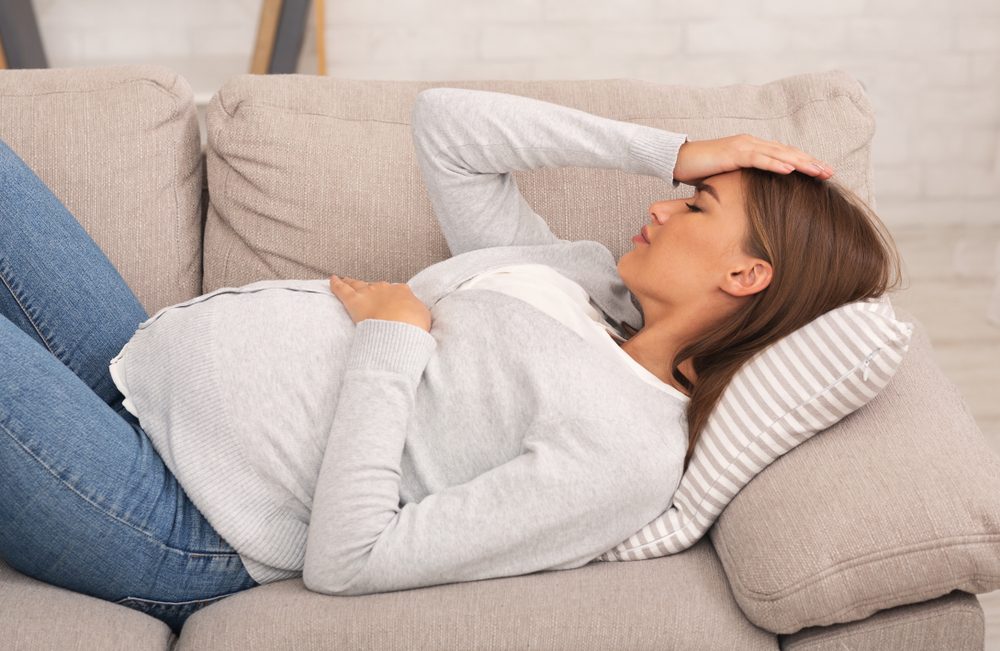 الأعراض غير الطبيعية قد تنذر بمخاطر الحمل - ShutterStock