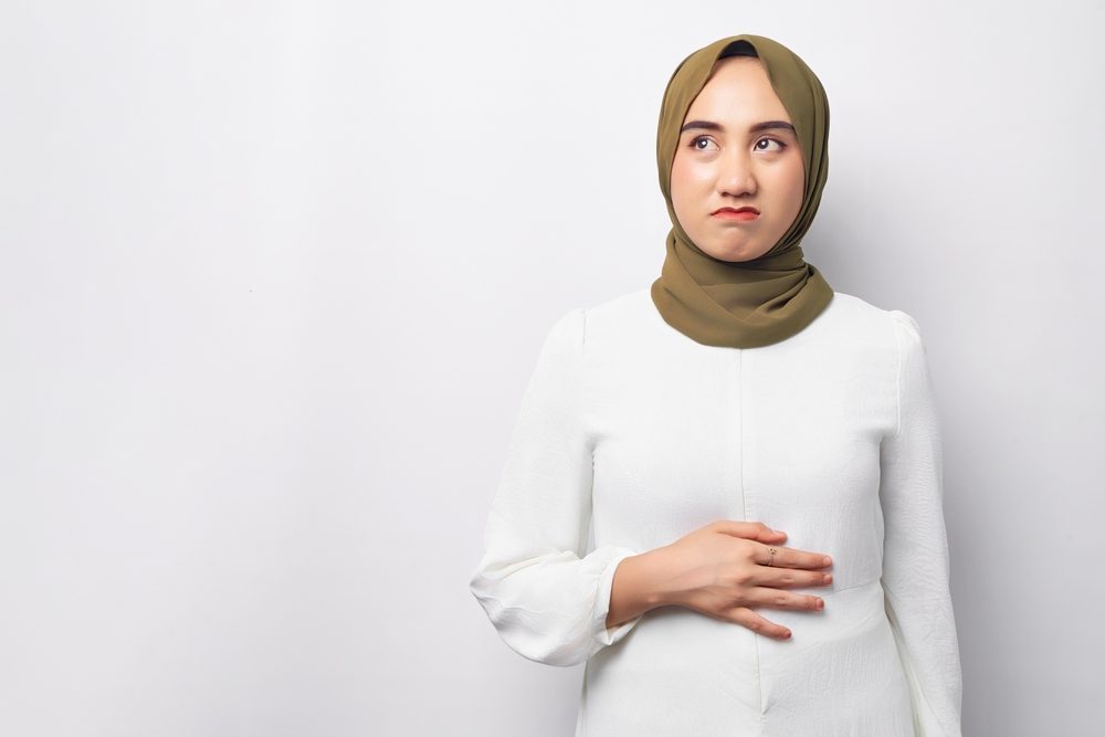 حين ترافق قرقرة البطن تقلصات، فاحذر/ Shutterstock
