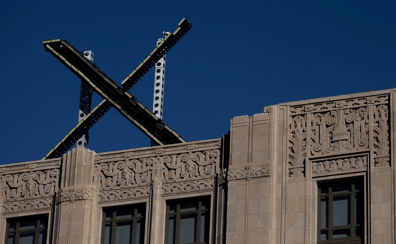 إزالة شعار إكس عطل