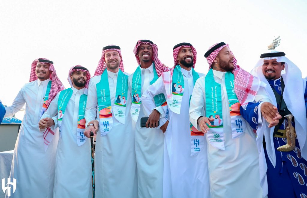 نجوم الدوري السعودي يحتفلون باليوم الوطني (رويترز)