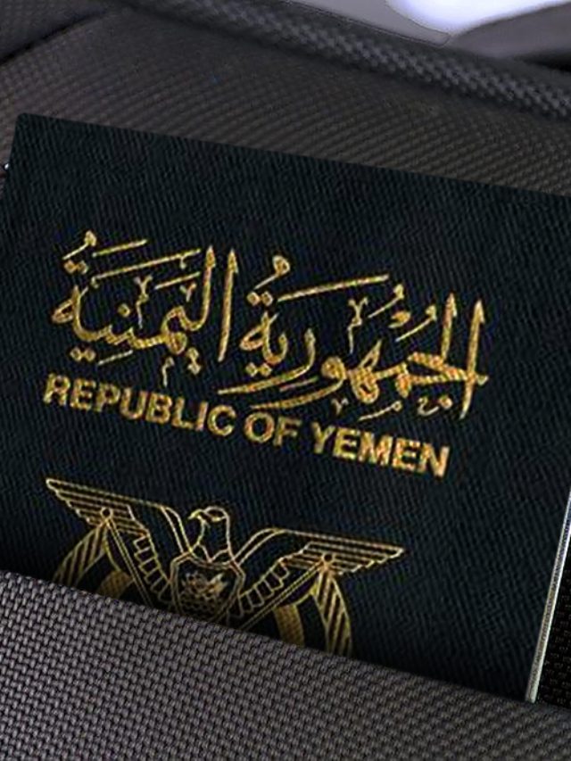 Close,Up,Of,Yemeni,Passport,In,Black,Suitcase,Pocket